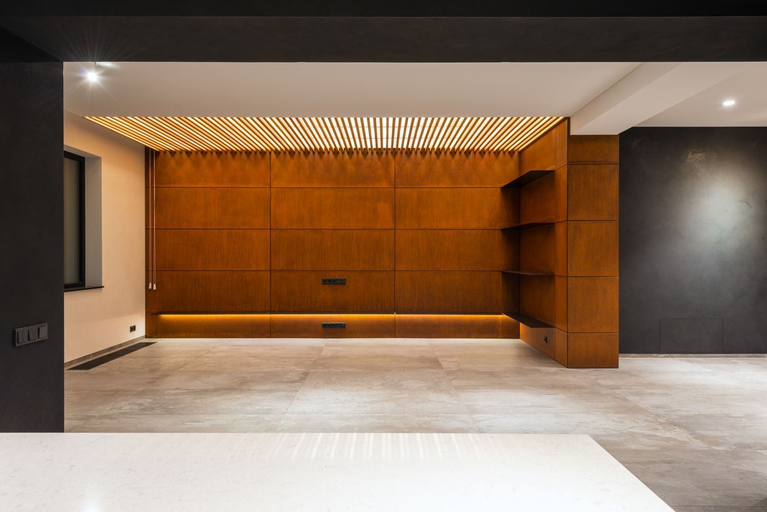 Panelled interior with integrated shelving