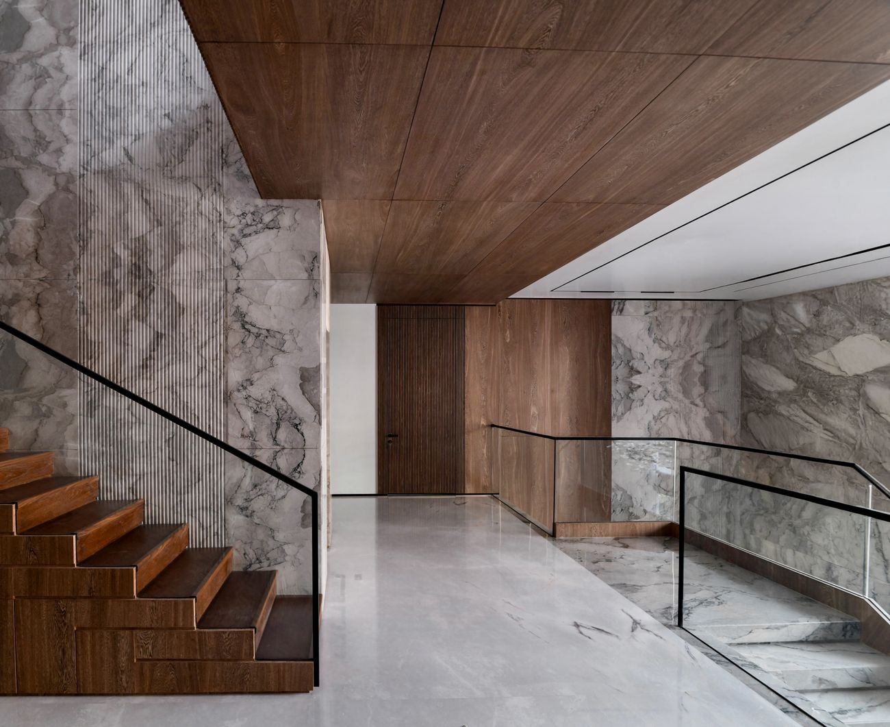 Timber ceiling and stair with stone walls