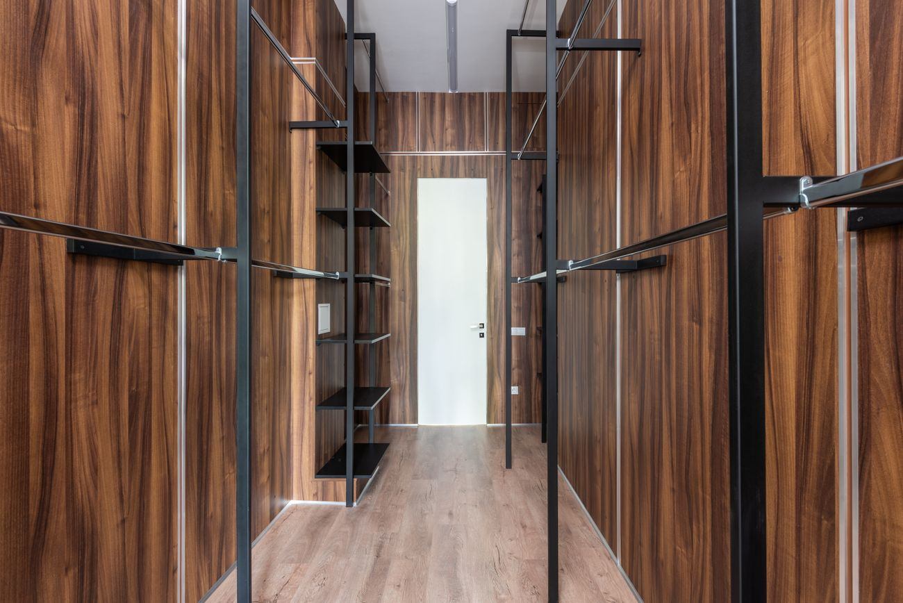 Walk-in wardrobe in figured walnut