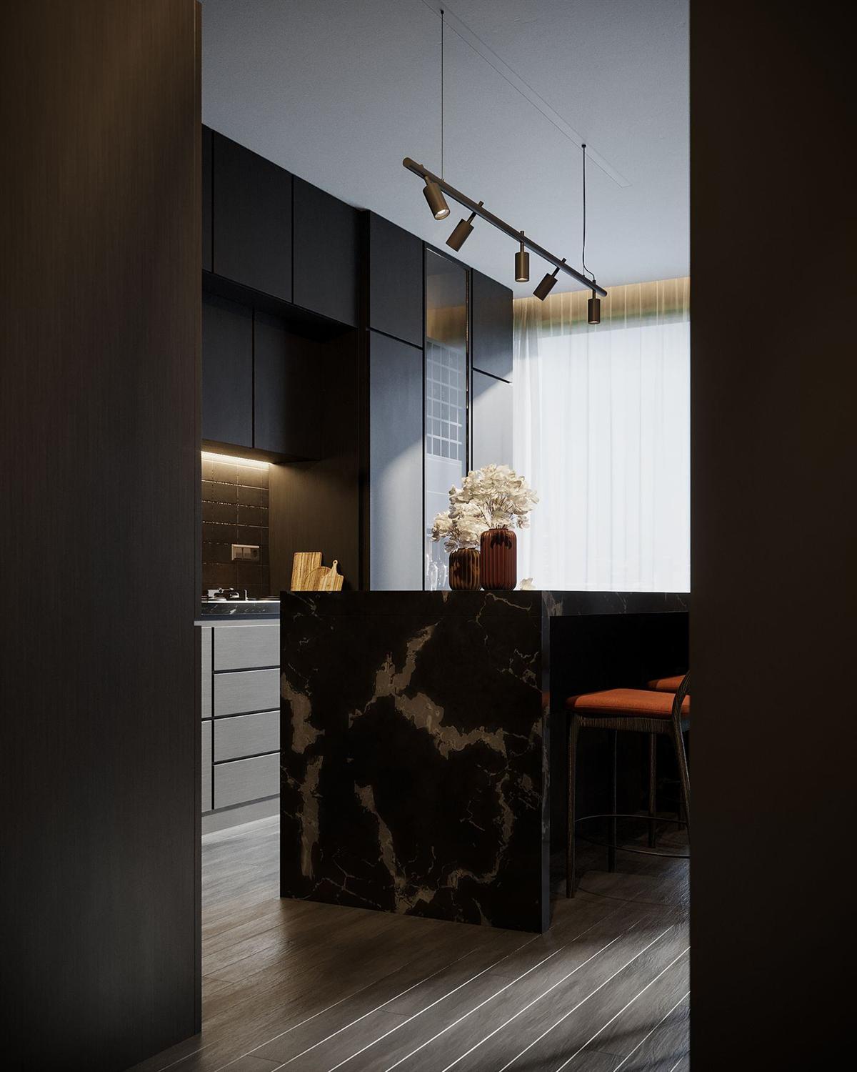 Dark inset kitchen with veined stone island